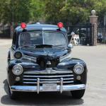 Frank arrives at the Range in style riding shotgun in a 1948 prowl car.